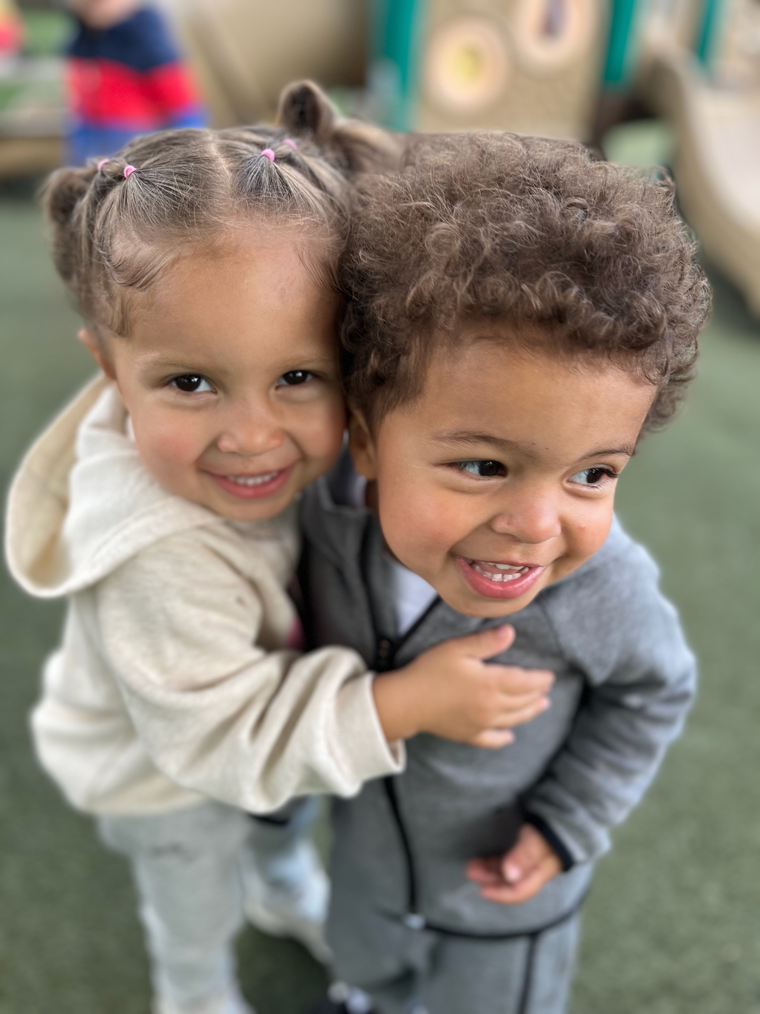 Children playing outdoors at LPC